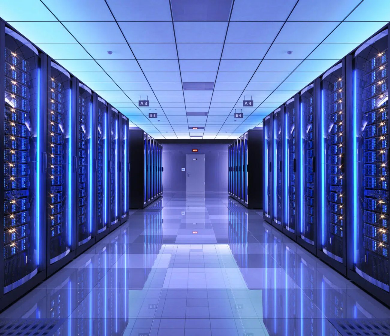Rows of illuminated server racks in a secure enterprise data center