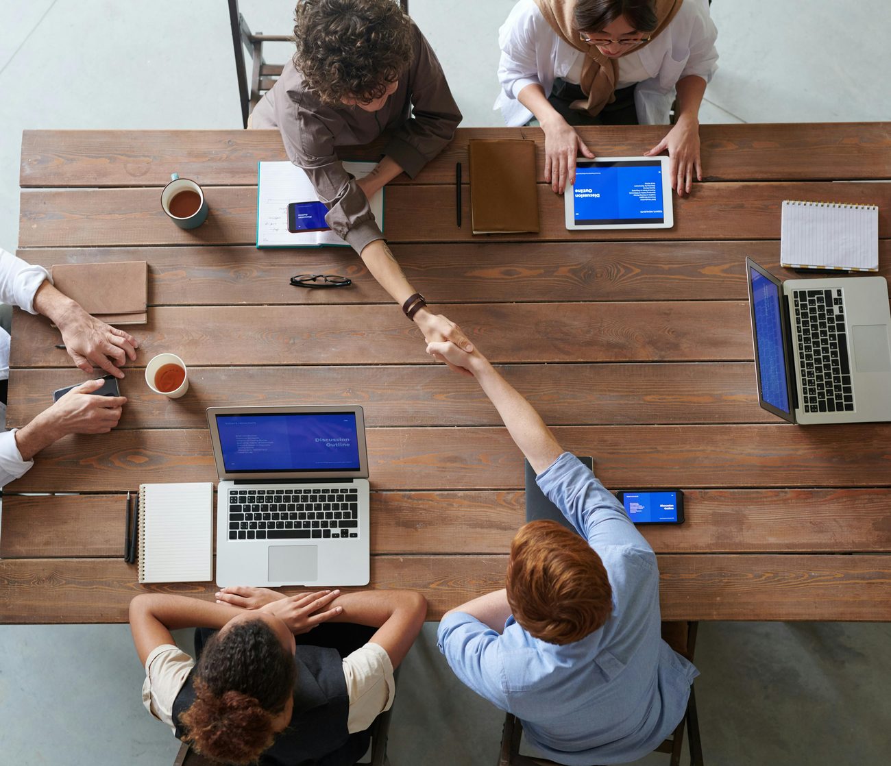 AdeptivIQ team collaborating with a client during a working session